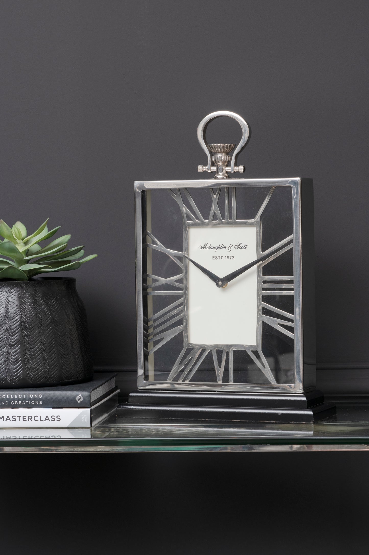 Silver And Black Skeletal Mantel Clock