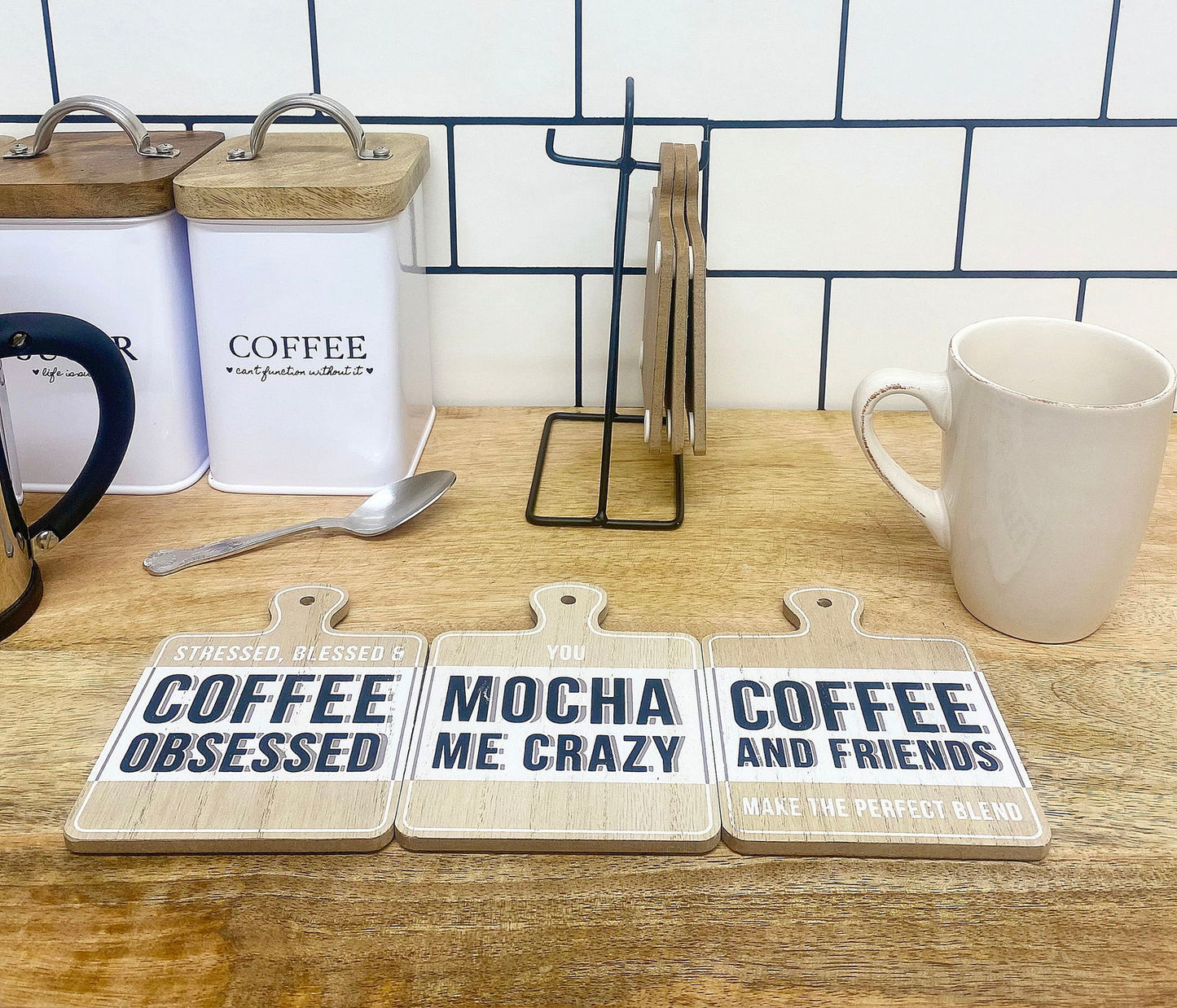 Set of Six Coffee Slogan Coasters On Metal Stand