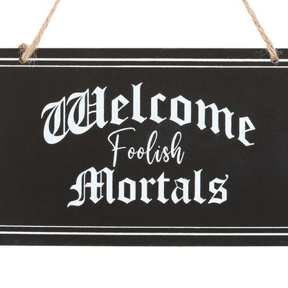 Welcome Foolish Mortals Hanging Sign